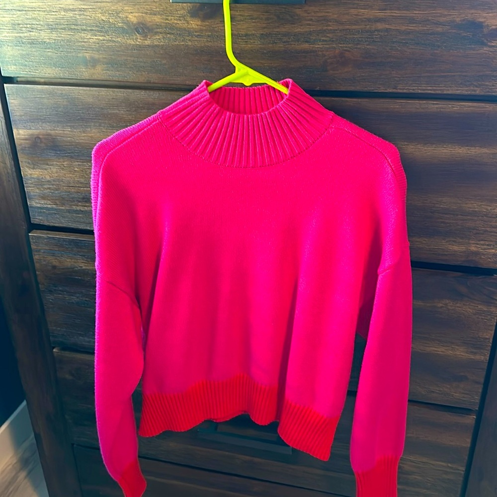Bright pink cropped sweater